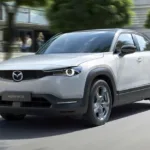 Mazda, Elektrikli Otomobil Şarj İstasyonları İçin Tesla ile Anlaştı Mazda, Elektrikli Otomobil Şarj İstasyonları İçin Tesla ile Anlaştı